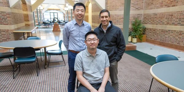 Professors Pengfei Song and Daniel Llano pose with graduate student Qi You who aided in Song and Llano’s research. Song and Llano collaborated in developing ultrasound imaging tools that can help study Alzheimer’s disease.